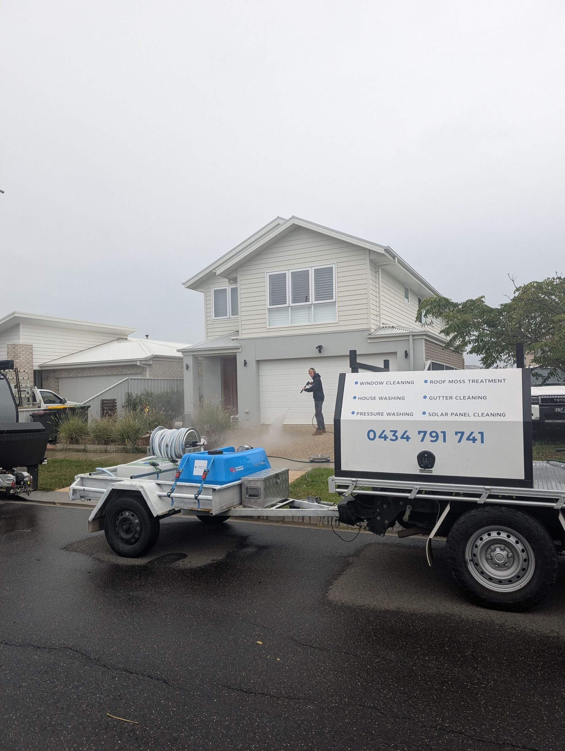 Coastal driveway pressure wash — Coastal Geelong driveway pressure-washed clean of salt and tyre marks ready for visitors.