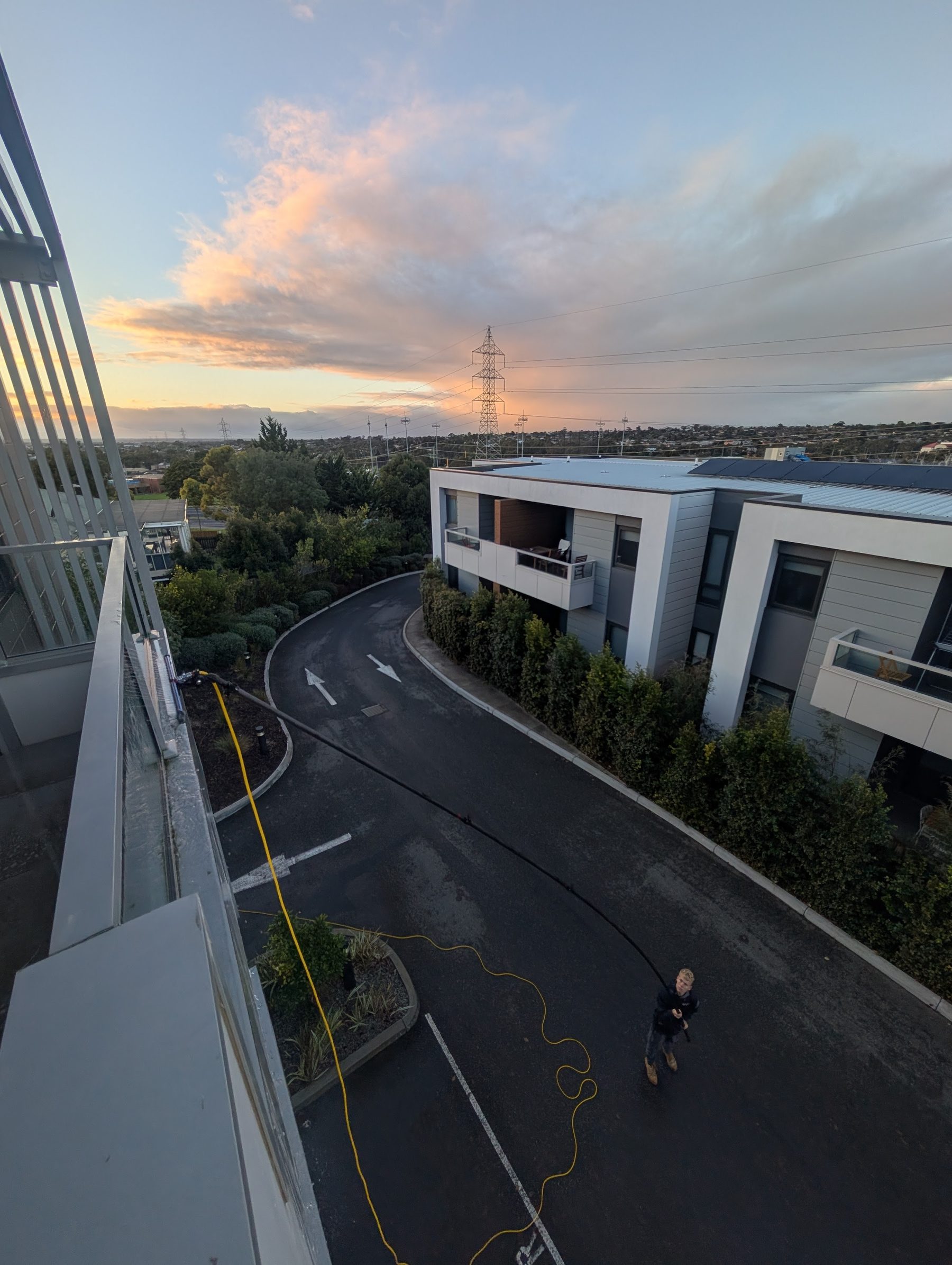 Triple story window clean sunset wrap-up — Late afternoon window clean on a coastal Geelong property after the day's wash.